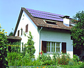 House with photovoltaic cells on the roof
