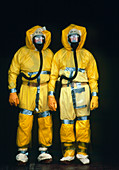 Two workers wearing protective clothing