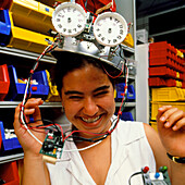 Girl wearing a robot controlled hat