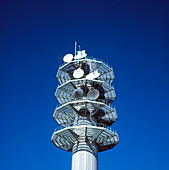 Telecommunications tower for relaying microwaves