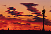 Telecommunications tower at sunset