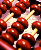 View of an abacus on a computer printout