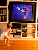 Young child watches television