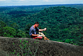 Field biologist using a global positioning system