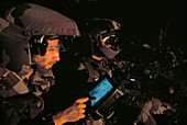 Soldiers using global positioning system