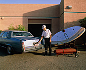 Car being filled with liquid hydrogen fuel