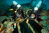 Diver exploring the Cross Wreck