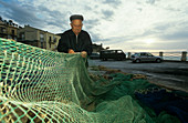Repairing fishing nets,Sicily