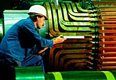 Engineer assembles an electrical generator