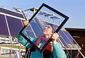Woman holding an Interpane thermotrope window
