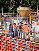 Men working on a section of reinforced concrete
