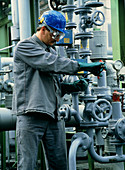 Maintenance work on pipes at a chemical plant