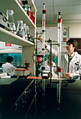 Chemist & liquid-column chromatography equipment