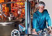Technician working in a drug production factory