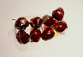 Eight red apples packaged