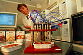 Researcher analysing food from a microwave