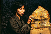 Neurobiologist with beehive