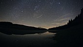 Stars over lake timelapse