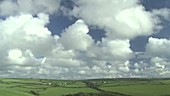 Cumulus clouds over fields