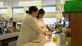 Female pathologists working in the lab