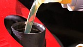 Pouring oil - close-up