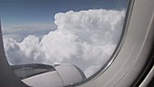 In-flight airplane window view