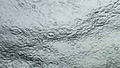 Rain on water from below