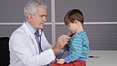 Doctor using stethoscope