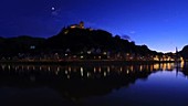 Moon over German castle, timelapse