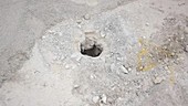 Shot hole for quarry explosives