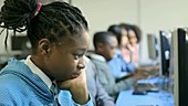 School children using computer