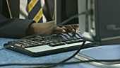 Schoolboy using computer