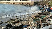 Wrecked boat debris on shore