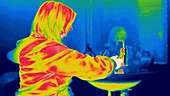 Hot towel on face, thermogram footage