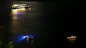 Boats at night in Santorini