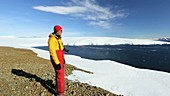 Photographer on Antarctic coast