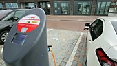 Electric car at charging station