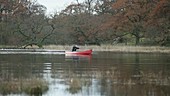 Man paddling on a river