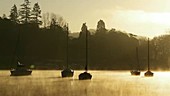 Mist over a lake at dawn