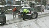 Car pushed through snow