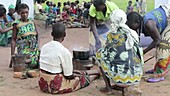 Women cooking in refugee camp, Malawi