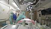 Nurses prepare operating theater for surgery