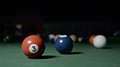 Pool ball collisions, slow motion