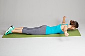 Back lift - Step 1: lie flat, arms out to the side
