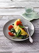 Spinach omelette with tomatoes