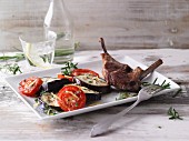 Lamb chops with an aubergine and tomato medley