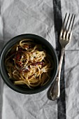 Spaghetti carbonara with Parmesan cheese (seen from above)