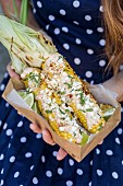 Elotes (grilled corn cobs, street food from Mexico)