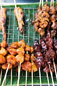 Various satay kebabs at a cookshop stand (Thailand, Asia)