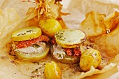 Various types of potatoes in parchment paper